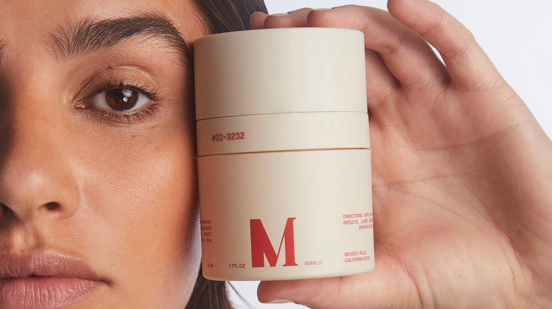 Woman holding Instafacial Emulsion